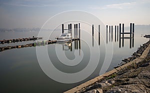 Boats and pier anchors tied to the pier in the Danube