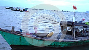 Boats on pier. Vietnam. Village of fishermen. Pier with fishing boats at a pier. Boats stand at a pier. Traditional