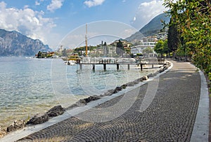 boats and promenade Malcesine on the shores of Lake Garda