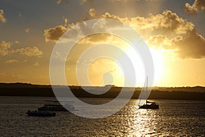 Boats rest on the river, the background, an amazing sunset in the river. photo