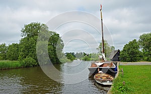 Boats on the river Ant at How Hill Norfolk England.