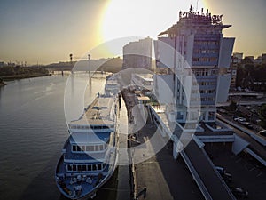 Boats on the river Don and city panorama at sunset. Rostov-on-Don, Russia. Aerial view