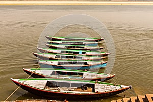 Boats in a row on Ganges River in Varanasi.