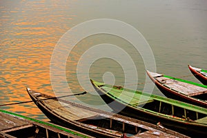 Boats in a row on Ganges River in Varanasi.