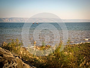 Boats at the sea of Galilea, Israel photo