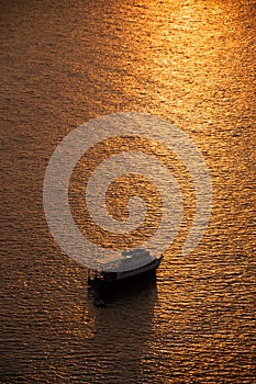 Boats in the sea and the sunset sky