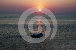 Boats in the sea and the sunset sky