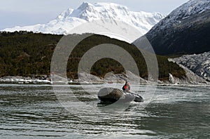 Boats from the ship Via Australis in the Bay of the Pia glacier.