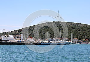 Boats and Ships at Cesme Port and Wind Turbine
