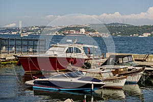 Boats and ships sail through the Bosphorus in Istanbul.