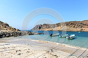 Boats in small harbor near Sadh, Dhofar (Oman) photo