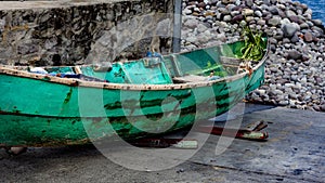 Small row boat used by fisherman on the island of Barbaros photo