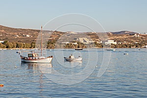 Boats at sunset in Adamas village