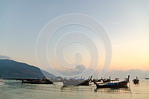 Boats sunset in the sea