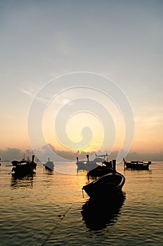 Boats sunset in the sea