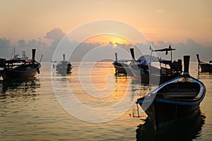 Boats sunset in the sea