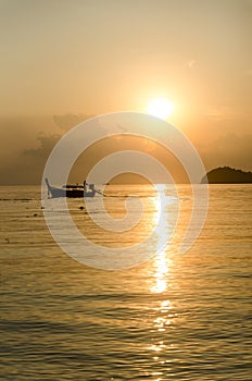 Boats sunset in the sea