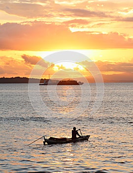 Boats on sunset sea