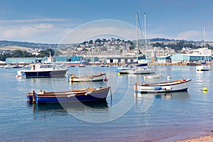 Boats Teign river Teignmouth Devon tourist town with blue sky