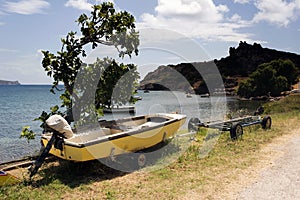 Boats on the trailer in the beautiful beach in the island of Patmos, Greece in summer time