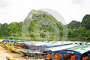 Boats for transporting tourists to Phong Nha cave, Phong Nha - Ke Bang national park, Viet Nam.