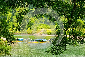 Boats for transporting tourists to Phong Nha cave, Phong Nha - Ke Bang national park, Viet Nam.