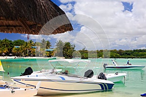 Boats at tropical beach resort