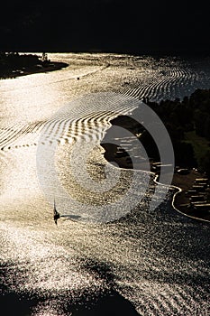 Boats on Vltava river during sunset-Czech Rep.