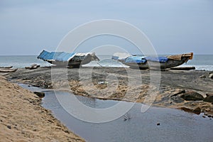 Boats waiting for fairer weather in Varkala, India