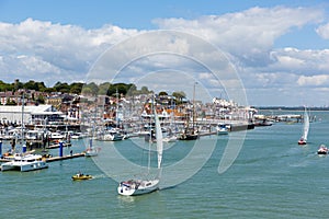 Boats and yachts Cowes harbour Isle of Wight with blue sky