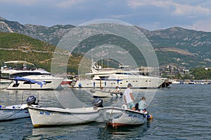 Boats and yachts moored in Budva bay in Montenegro at summer