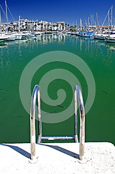 Boats and yachts moored in Duquesa port in Spain on the Costa de