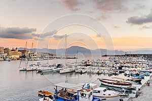 Boats and yatchs in the port of Torre del Greco in the gulf of Naples, on background Sorrento peninsula, Campania, Italy