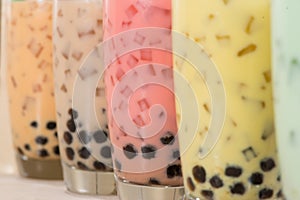 Boba / Bubble tea. Homemade Various Milk Tea with Pearls on wood