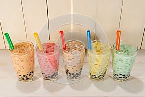 Boba / Bubble tea. Homemade Various Milk Tea with Pearls on wood