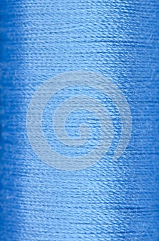Bobbin of blue thread