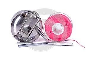 Bobbin case, plastic bobbin and sewing needles