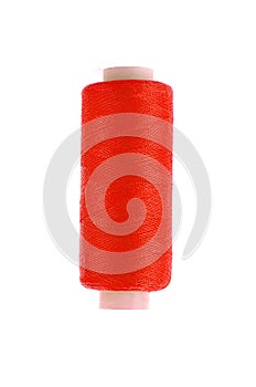 Bobbin of red thread isolated