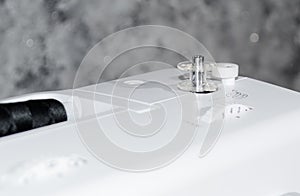 Bobbin on a sewing machine.Close-up