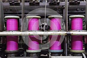 Bobbins with pink rope