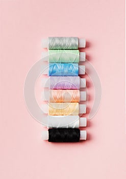 Bobbins spools of cotton thread for sewing