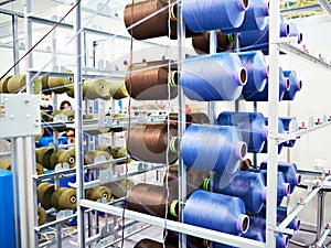 Bobbins of thread for cord knitting machine