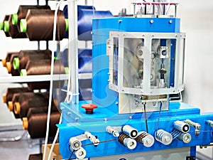 Bobbins of thread for cord knitting machine