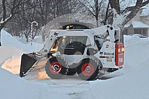 Bobcat doing snow removal