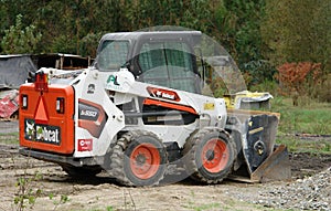 Bobcat S550 skid-steer loader parked on a construction site