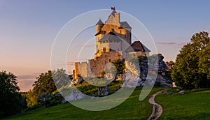 Bobolice Castle in Poland in the rays of the setting sun .The castle is part of the system of strongholds known as the Eagles`