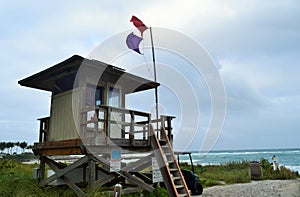 Boca Raton guardhouse with palm trees and Atlantic ocean