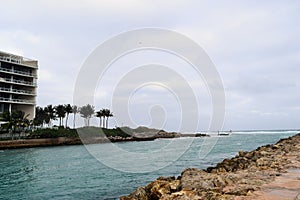 Boca Raton Inlet with palm trees and Atlantic ocean