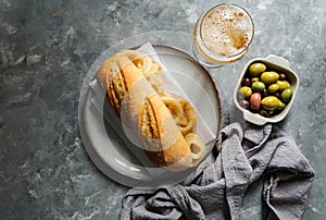 Bocadillo con calamares or squid sandwich with beer, photo