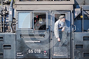 Bochum , Germany - April 18 2015 : Worker observing the activities at the railway main station